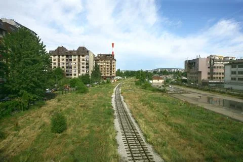Cargo train platform railway tracks in a rural scene Stock Photos