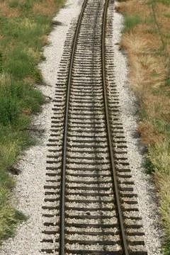 Cargo train platform railway tracks in a rural scene Fotos Stock