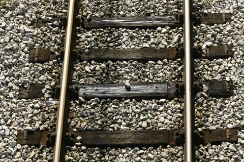Cargo train platform railway tracks in a rural scene Stock Photos