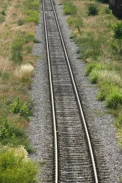 Cargo train platform railway tracks in a rural scene Foto stock