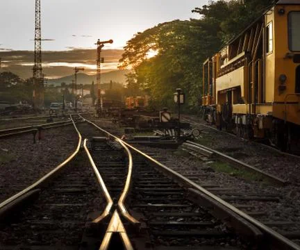 Cargo train platform at sunrise Stock Photos