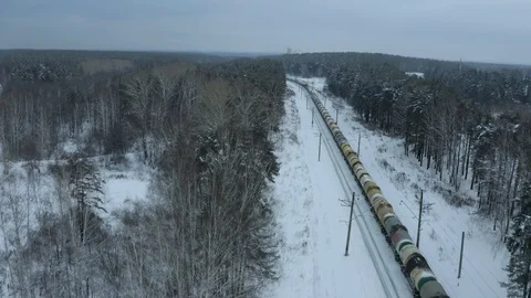 Cargo train pulls up to the station , winter landscape, forest, many railway 스톡 동영상 126361219