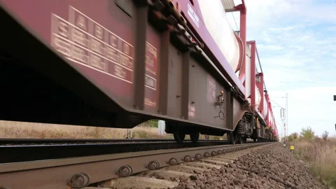 Cargo train on the railroad loop endless Stock Footage 163448915