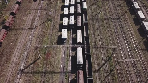 Cargo trains close-up. Aerial view of colorful freight trains Stock Footage 140260498