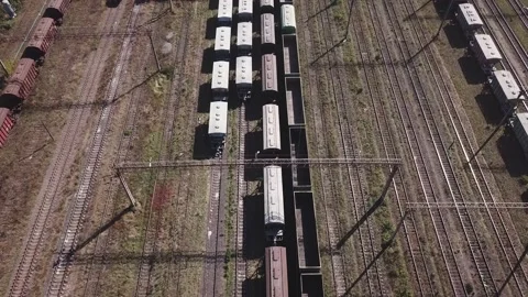 Cargo trains close-up. Aerial view of colorful freight trains Stock Footage 140260519