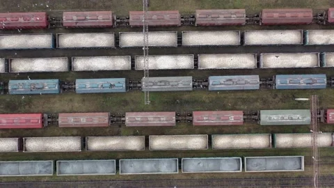 Cargo trains close-up. Aerial view of colorful freight trains Stock Footage 167840593