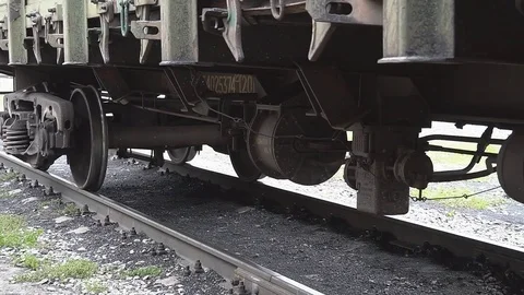 Cargo trains in old train depot eaten by the rust Stock Footage 83799739