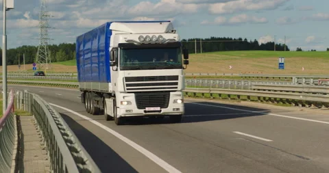 Cargo truck driving on a road. Stock Footage