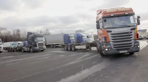 Cargo truck with empty trailer ride at parking Stock Footage 60129562