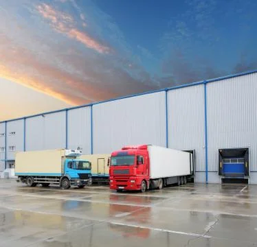 Cargo truck at warehouse building Stock Photos