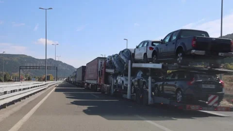 Cargo Trucks Queue Drive Video stock 276691759
