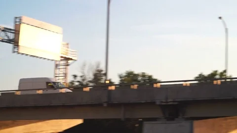 Cargo Van Speeding Across Bridge - Downtown View from Canal Lachine Stock Footage 81156307
