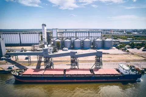 Cargo vessel in a dock Stock Photos