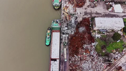 Cargo vessel docked at shipyard for loading and unloading operations 動画素材 337941061