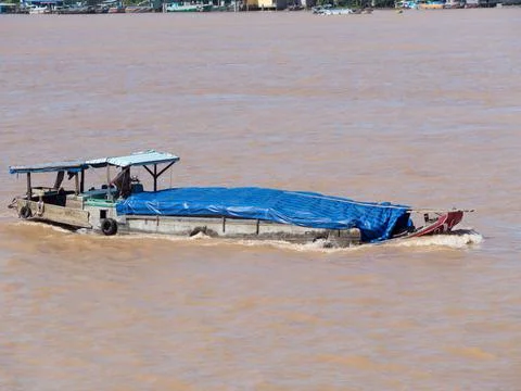 Cargo vessel on Mekong River Stock Photos
