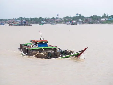 Cargo vessel on Yangon River Stock Photos