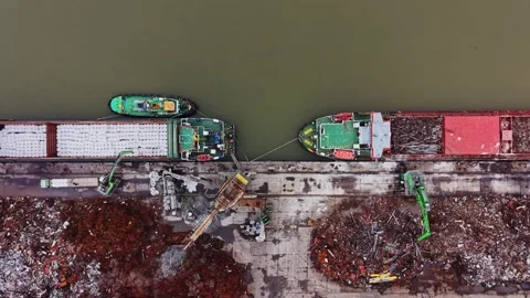 Cargo vessels dock at shipyard for loading and unloading activities 動画素材 337942355