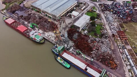 Cargo vessels dock at shipyard for transport and loading of materials 動画素材 337941538