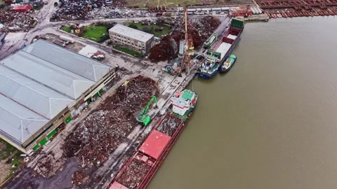 Cargo vessels at shipyard loading materials for transport Stock Footage 337940952