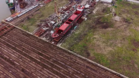 Cargo vessels at shipyard undergoing maintenance in busy transport area Vídeo Stock 337940939