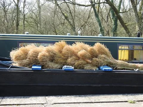 Cargo of wheat sheaves on barge Stock Photos