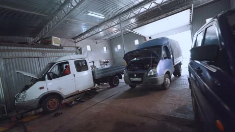 Cargo workshop, repair and maintenance of commercial vehicles, auto repair Stock Footage 211878115