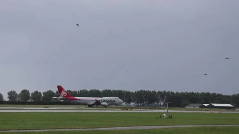 Cargolux 747 cargo plane taking off from Schiphol airport 動画素材 212638942