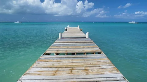 Caribbean Beach Background With Old Boat Dock Vídeos de archivo 77209419