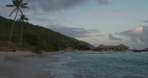 Caribbean beach bar by sunset Stock Footage 146787460
