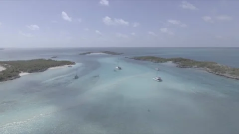 Caribbean Crystal waters and catamaran Stock Footage