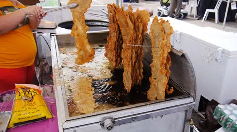 Caribbean fried cod-flour cakes - bacalaitos Stock Footage 24758055