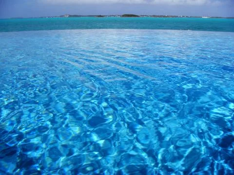 Caribbean Ocean next to a pool Stock Photos