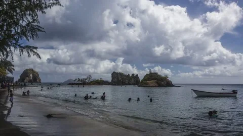 Caribbean: St. Vincent, Beach with Clouds and Swimmers Stock Footage 70724751