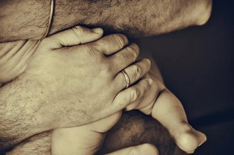 With caring dad's hands, nothing is scary in this world Stock Photos
