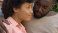 Caring husband cuddling beloved wife, happy together, family planning children HD Footage