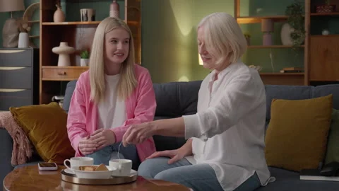 Caring Mother Making Tea While Spending Cozy Evening With Daughter At Home 스톡 동영상 334738312