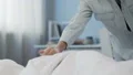 Caring mother trying to wake up daughter to school in morning, rebellious child HD Footage