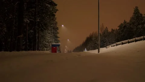 Carlights Passing By Wintertime Stockbeeldmateriaal 169790982