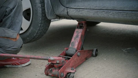 The carmaker raises the car Stock Footage 86407261