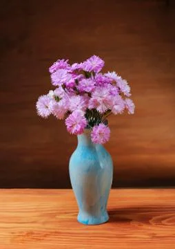 Carnation in a ceramic vase on the table Foto stock