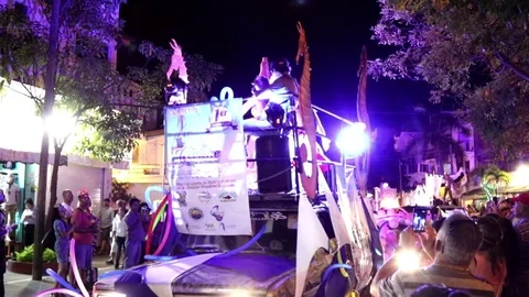 Carnaval, people dancing on top of a truck, changing lights Stock Footage 78040724