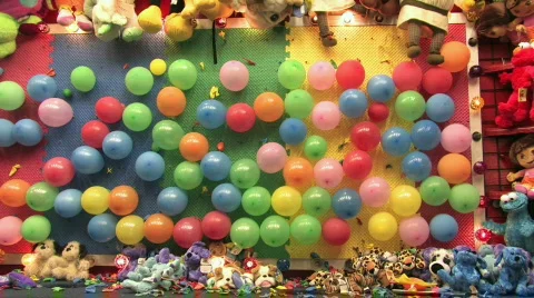 Carnival balloon dart HD Stock Footage 125103