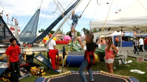 Carnival Cable Jumping Stock Footage 755813