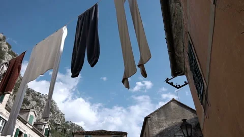 Carnival clothes hung on a rope for drying Stock Footage 102174458
