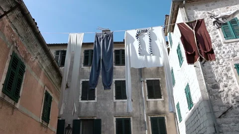 Carnival clothes hung on a rope for drying Stock Footage 102175835