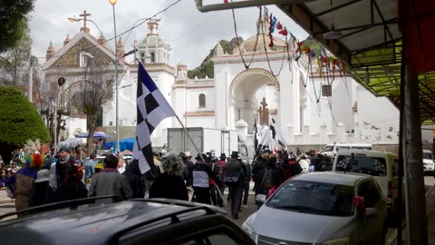 Carnival Crowd Carrying Flags Outside Church in Copacabana, Bolivia Видео 339733144