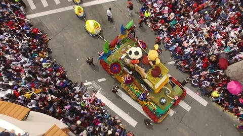 Carnival Float goes by as Crowd Watches during Parade in Ambato Stock Footage 73037117