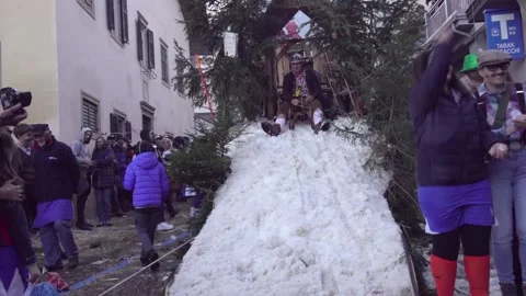 A carnival float with a short sled run at the Egetmann Parade Stock Footage 305211112