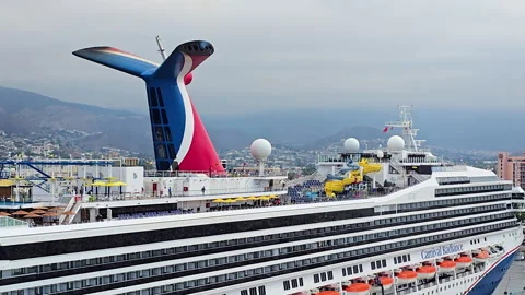 Carnival Radiance cruise ship docked at the Ensenada, Mexico port, offering 動画素材 330958341