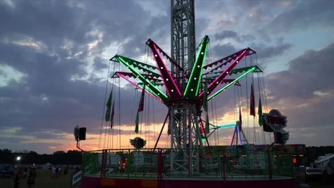Carnival rides at sunset Stockbeeldmateriaal 78160297